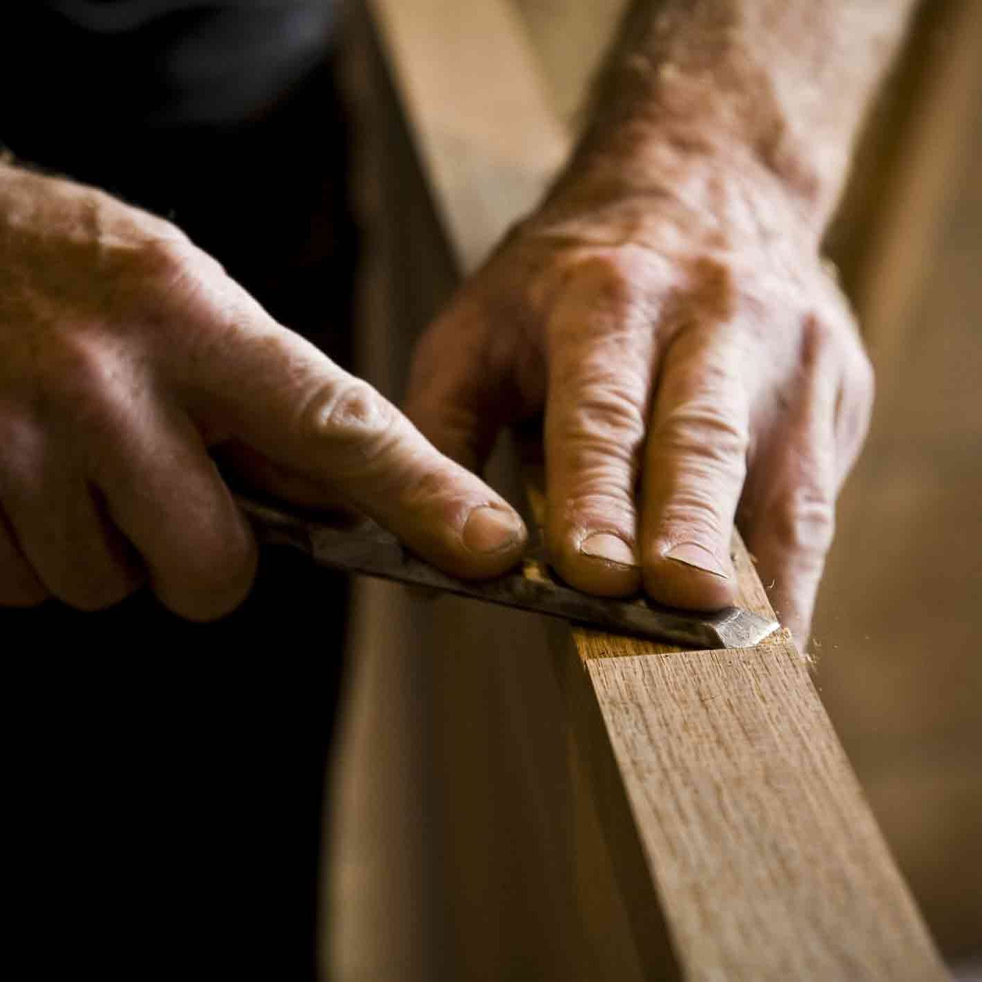 dreamstime_m_12437629 Carpenter s Hands at Work. Close-up of man doing carpentry. Horizontally framed shot.